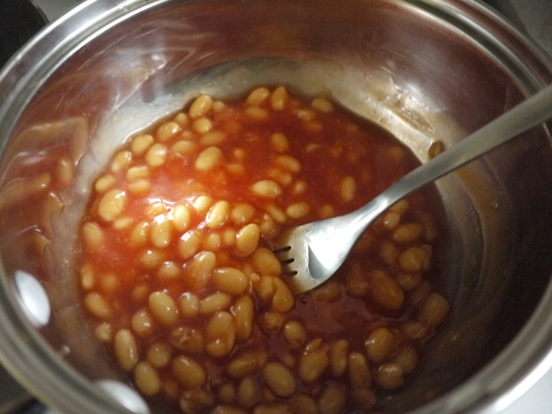 Heat the beans in a pot